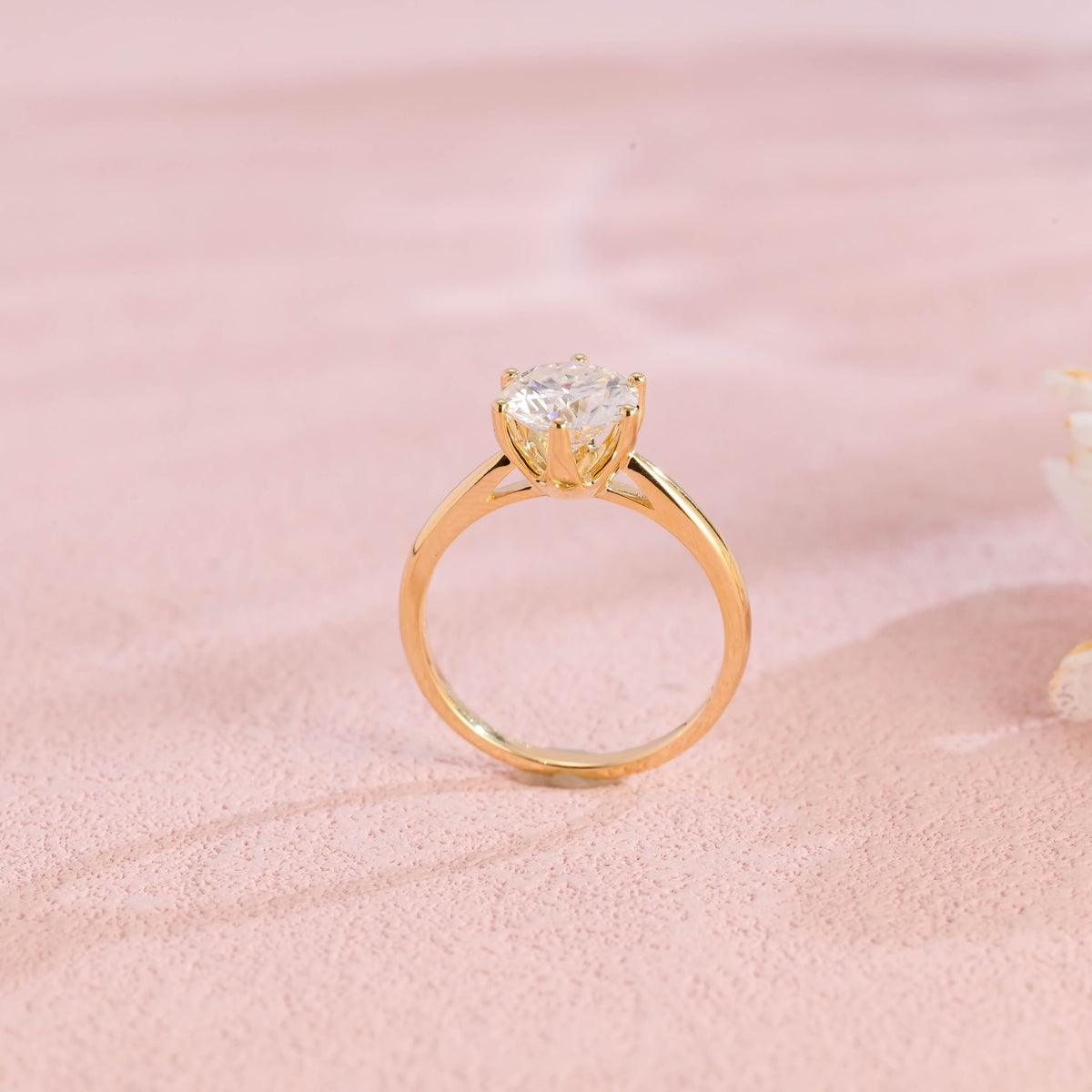 side profile view of high polish solid shank lab created round diamond ring with traditional 6 prongs