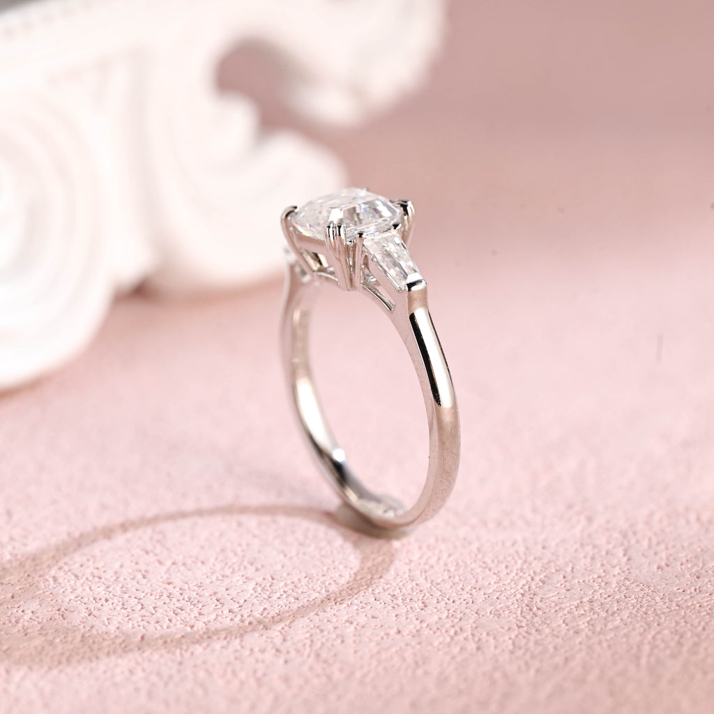Close up angle shot highlighting the clean step-cut facets of an asscher lab diamond ring.