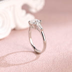 Close up angle shot highlighting the clean step-cut facets of an asscher lab diamond ring.