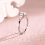 Close up angle shot highlighting the clean step-cut facets of an asscher lab diamond ring.