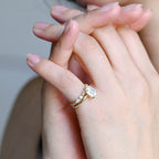 Exquisite marquise and round lab grown diamond cluster ring showcased inside a luxury jewelry gift box.