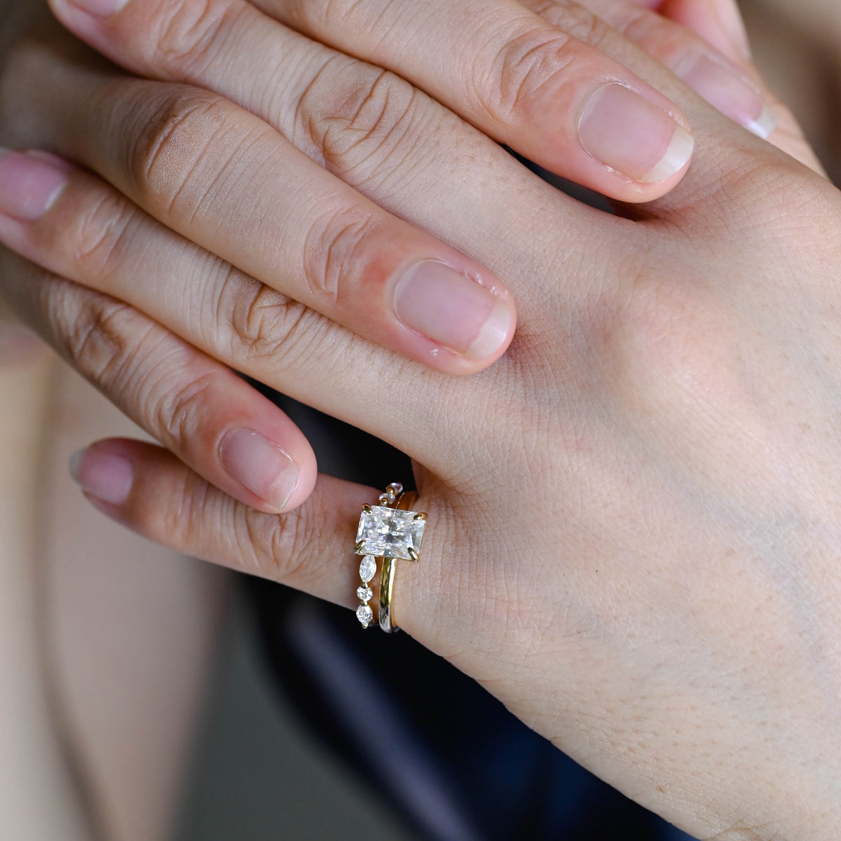 Exquisite marquise and round lab grown diamond cluster ring showcased inside a luxury jewelry gift box