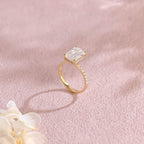 Side profile macro view of an emerald cut lab created diamond ring showing the intricate micro-pave basket and accent stones.