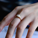 Premium ethical emerald cut lab grown diamond 3 stone ring showcased inside a luxury gift box with official IGI certification papers.