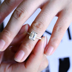 Exquisite emerald cut lab grown diamond ring with pave side stones showcased inside a premium luxury jewelry gift box.