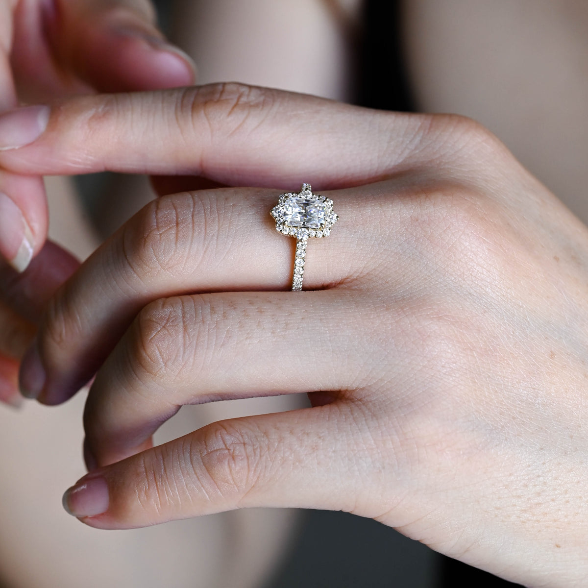 Exquisite radiant cut lab grown diamond halo ring with pave band showcased inside a premium luxury jewelry gift box.