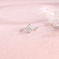 A minimalist 14k yellow gold princess cut lab grown diamond engagement ring featuring a sleek full bezel setting with a d color vs1 center stone.