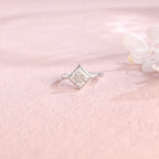 A minimalist 14k yellow gold princess cut lab grown diamond engagement ring featuring a sleek full bezel setting with a d color vs1 center stone.
