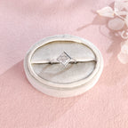 Side profile view of a modern princess cut lab created diamond full bezel setting showing the low-profile solid metal band design.