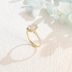 A luxurious radiant cut lab grown diamond engagement ring featuring a micro-pave halo and pave band with a d color vs1 center stone in white gold.