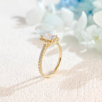 Side profile macro view of a radiant cut lab created diamond halo ring showing the intricate micro-pave basket and side stones.