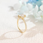 A luxurious radiant cut lab grown diamond engagement ring featuring a micro-pave halo and pave band with a d color vs1 center stone in white gold.